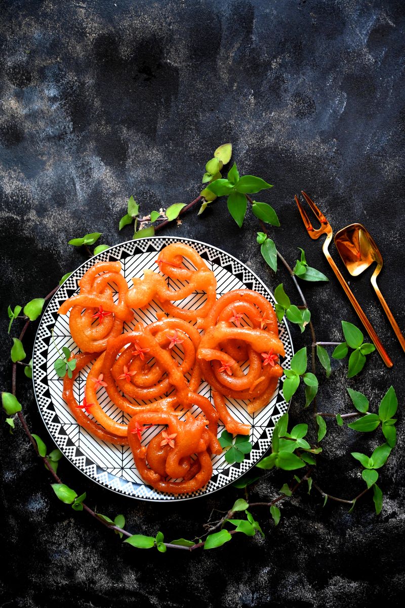 Hot jalebi, coiled and glistening, straight from the kadhai.