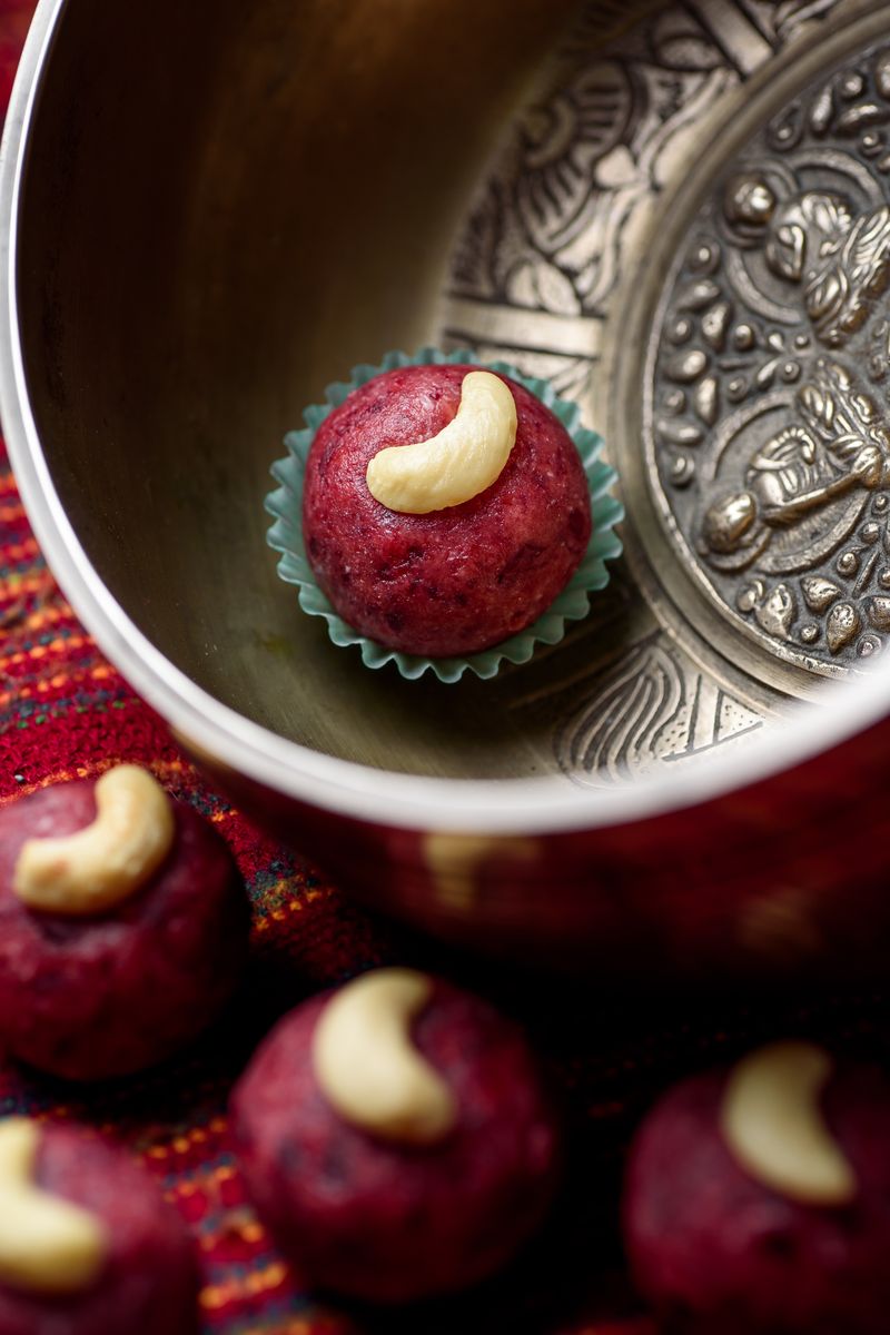 Motichoor ladoo topped with cashew, rolled fresh this morning.